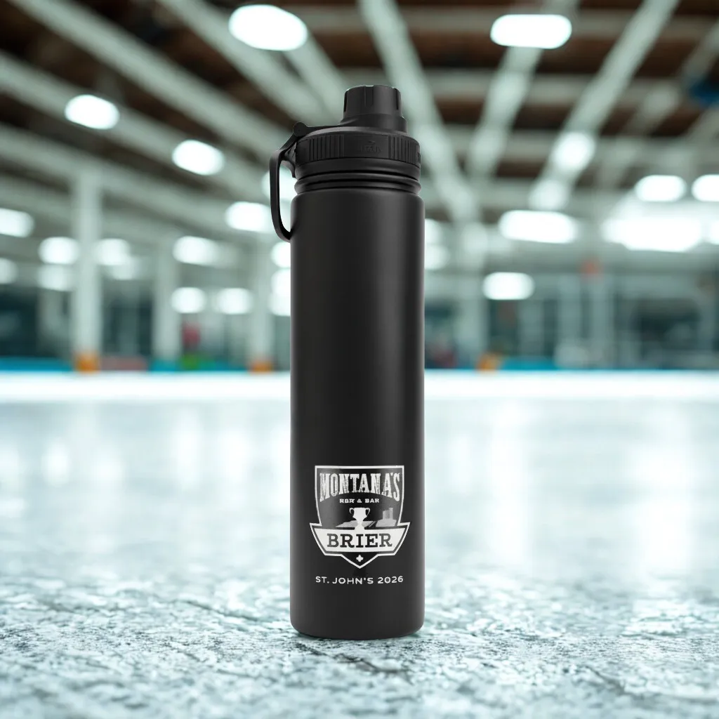 Black water bottle with a logo on an ice rink