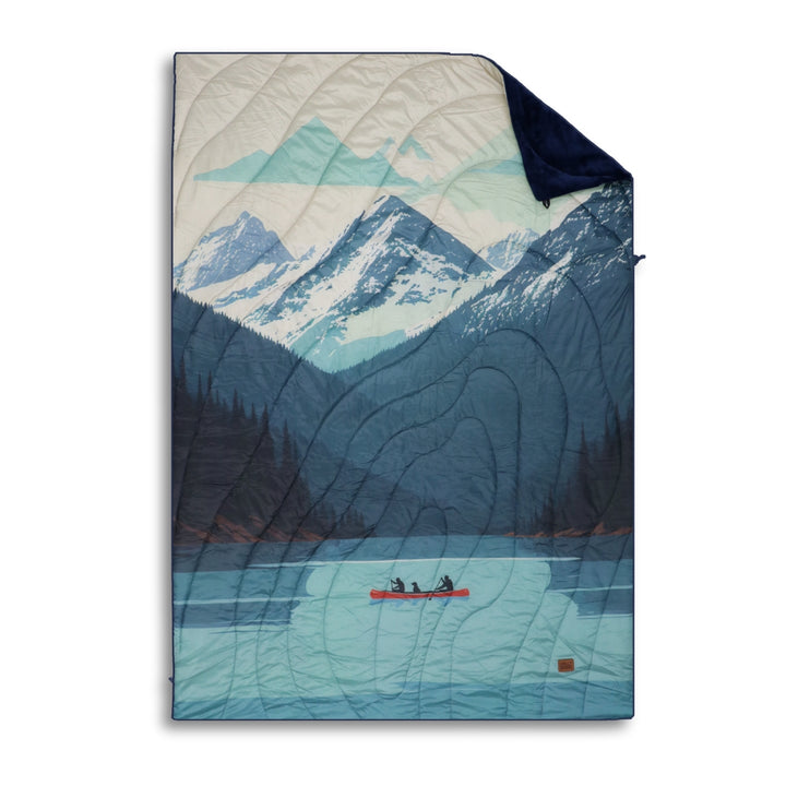 Stillwater Ultralight Puffy Blanket – Chilly Moose – Mountain canoe scene, flat lay view, navy/cream #colour_tofino