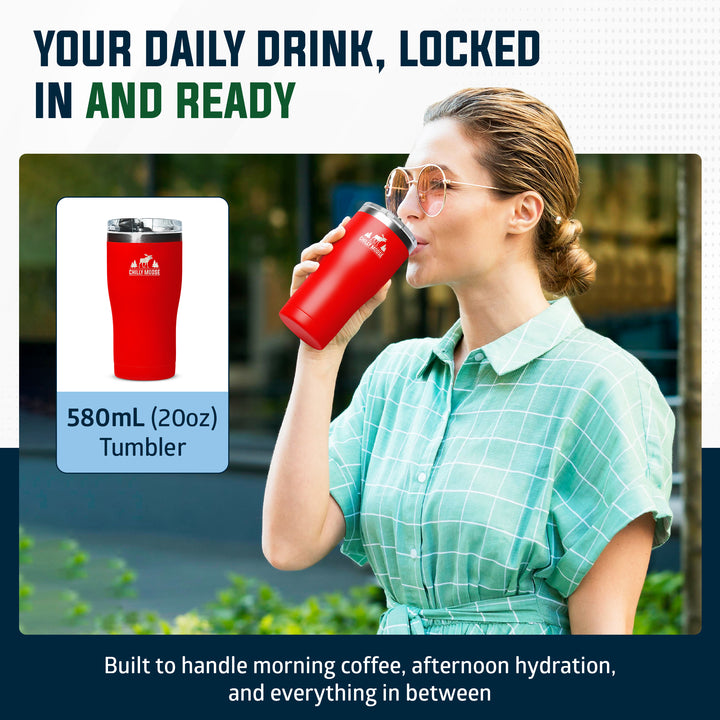 A woman in a mint green plaid shirt drinks from a red insulated tumbler outdoors. The image includes a product inset showing the red tumbler alone on a white background with text reading '580ML (20oz) Tumbler,' plus marketing text at the top and bottom.#colour_canoe-red