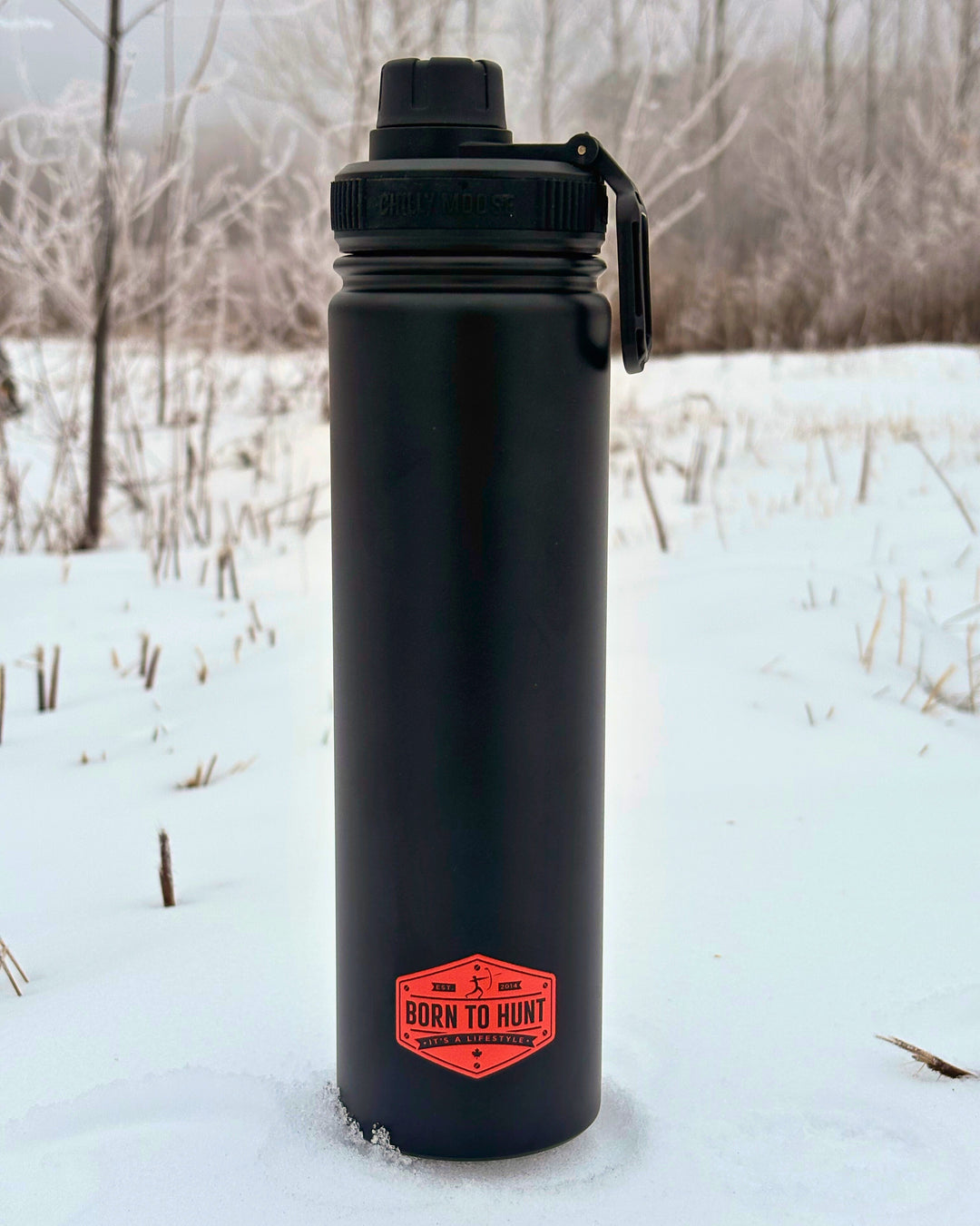 Born to Hunt Brunswick Bottle 709mL in Midnight – Chilly Moose – Snowy outdoor setting #colour_midnight