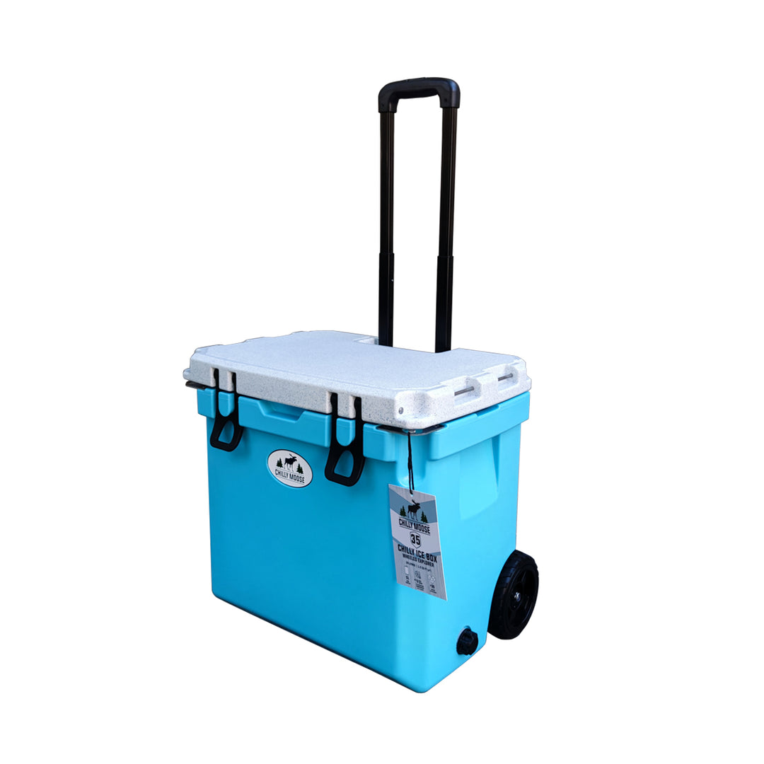 Open Box 35L Wheeled Explorer in Tobermory – Chilly Moose – Side angle with handle and wheel #colour_tobermory